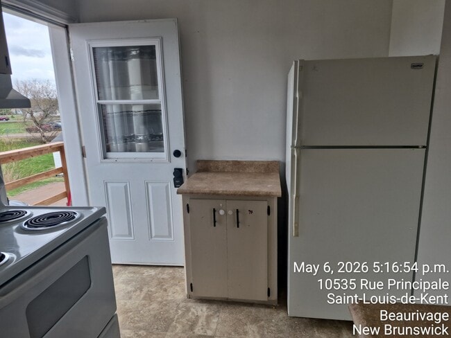 Building Photo - 10535 Rue Principale