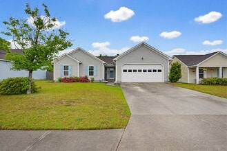 Building Photo - 208 Red Carnation Dr