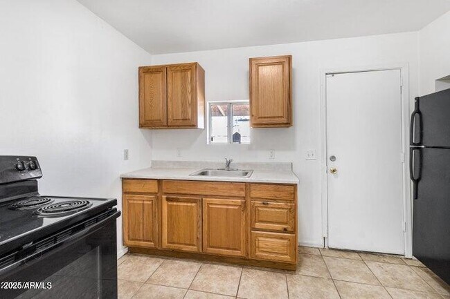 Foto del edificio - 412 W 9th St