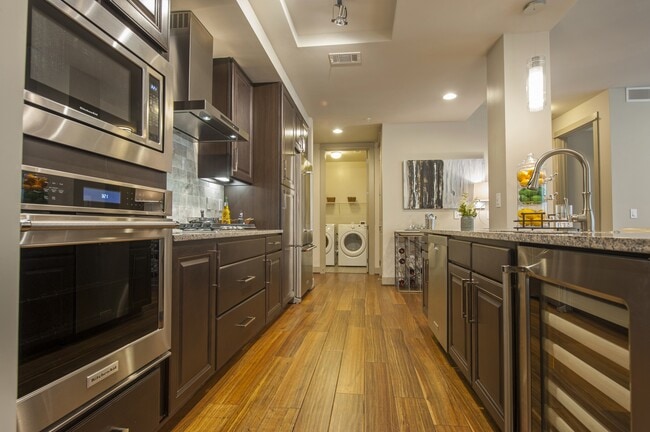 Clean lines and modern finishes for inspired cooking. - Pearl Residences