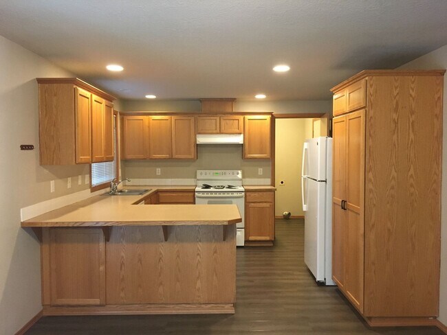 Building Photo - Spacious 4-Bedroom Home with Classic Charm...