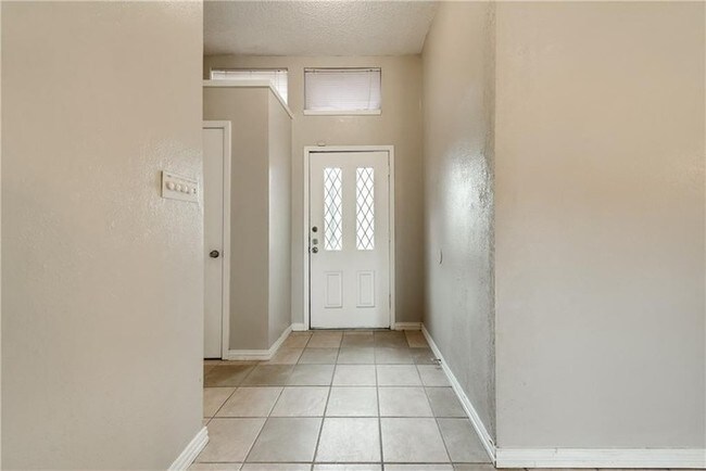 Building Photo - 4 Bedroom, 2 Bath with rear entry garage