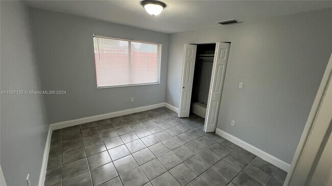 Building Photo - 9421 NW 30th Ct