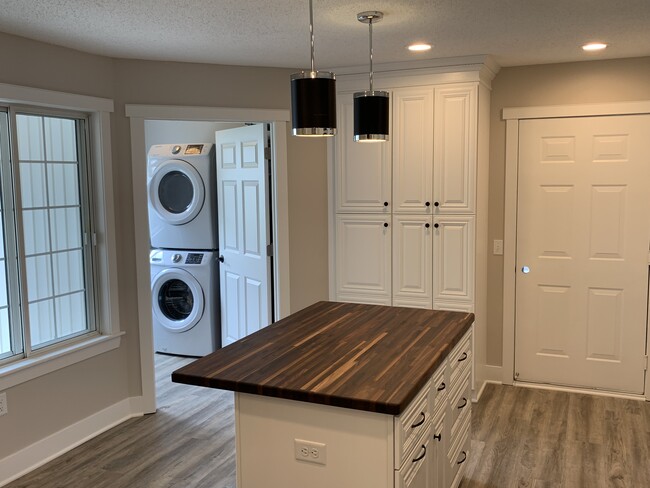 New Walnut butcher-block island, pantry storage and laundry room - 9057 Prairieview Ln N