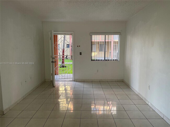 Building Photo - 5480 W 21st Ct
