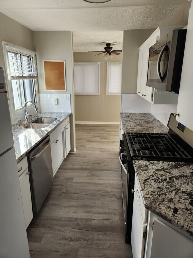 Photo - 3 bed, 2 bath, 1 car garage Newly remodeled with fenced backyard! House