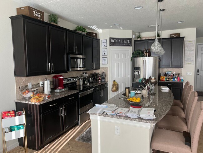 Building Photo - PRICE REDUCTION: 5-BR Corner Lot Home in Crown Pointe Cove – Spacious & Bright!