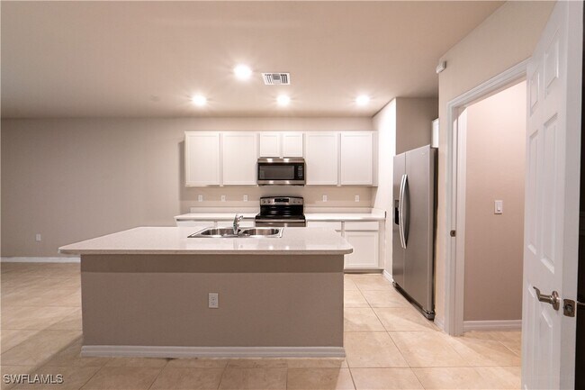 Building Photo - 15421 Wildflower Cir