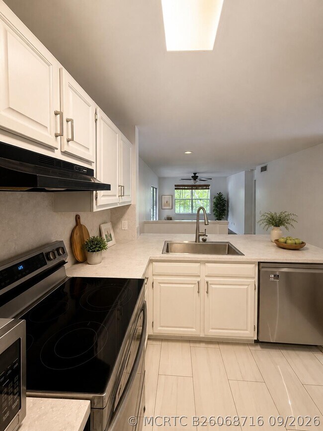 Building Photo - 1865 Palm Cove Blvd