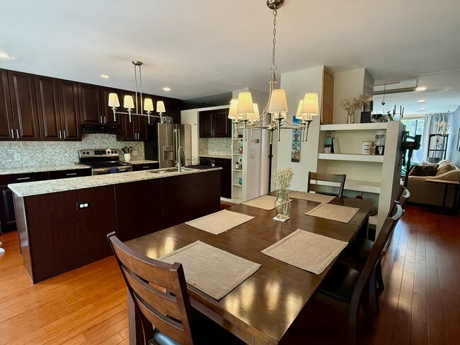 Open kitchen and dining room. - 960 N Pennsylvania St