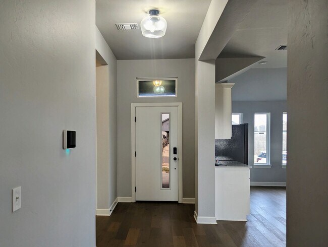 Foto del edificio - Spacious Yukon Home with Storm Shelter, 2-Car Garage & Fenced Yard!