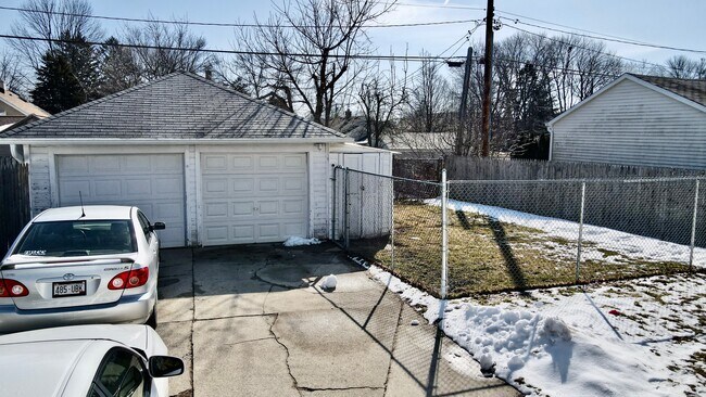 Detached Garage and Slab Parking and Fenced-In Dog Run - 2507 N 23rd St