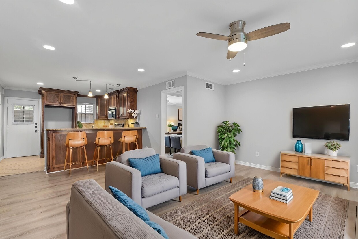 Living Room Virtually Staged with view of Kitchen - 5084 Matilda St