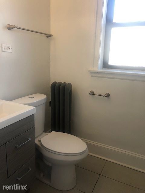 Foto del edificio - 2 br, 1 bath Apartment - 4748 S Woodlawn Ave