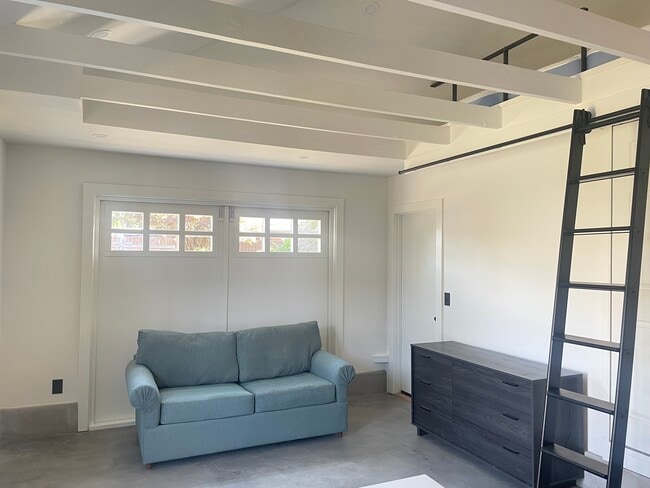 The space is partially furnished, and has a pullout couch for the occasional guest. - 2220 Belmont Ave