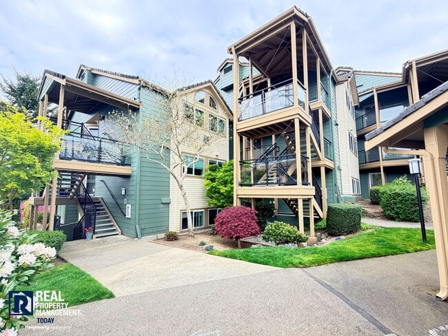 Building Photo - Updated 2 Bed Condo Near the Narrows – Water Views, Covered Parking & Prime Tacoma Location!