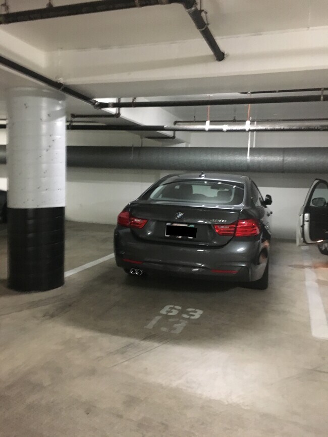 1 assigned parking space on first level - 1551 4th Ave