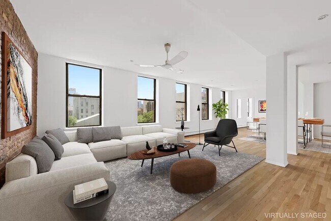 Foto del edificio - 211 E 3rd St