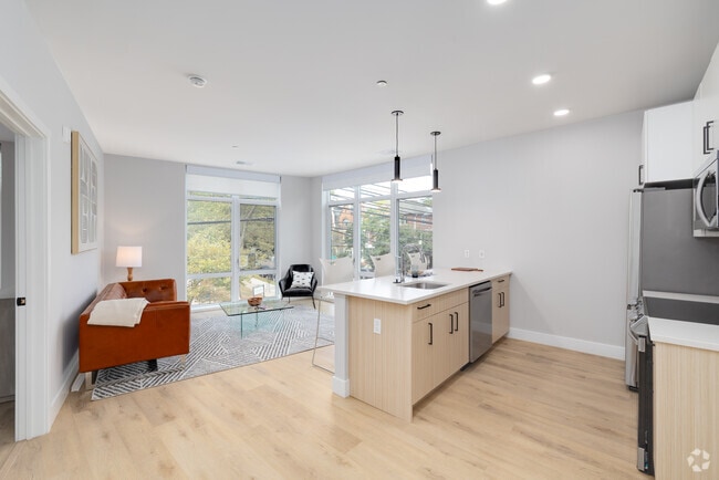 2BR, 2BA - 925SF - Kitchen/Living Room - The Linden University City Apartments