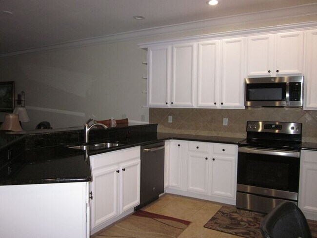 Building Photo - RARE TOWNHOUSE IN THE CARROLLWOOD VILLAGE COUNTRY CLUB