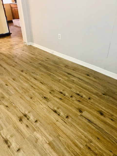 hardwood laminate flooring in living/dining rooms - 815 Maple Ave