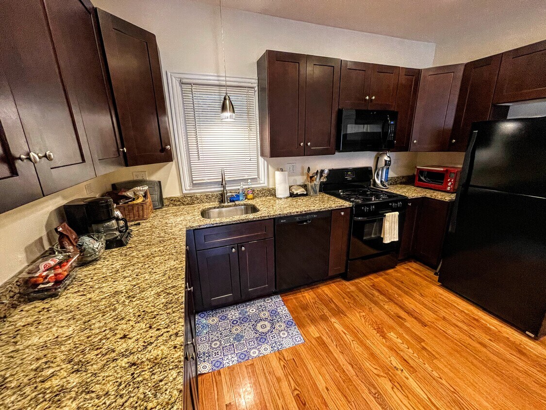 Modern Kitchen with new appliances - 1911 Asbury Ave