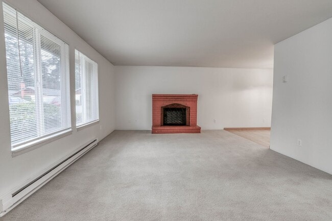 Building Photo - Condo Living with Electric Fireplace and F...