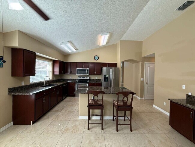 Building Photo - Spacious 3/2 with tranquil setting is wait...