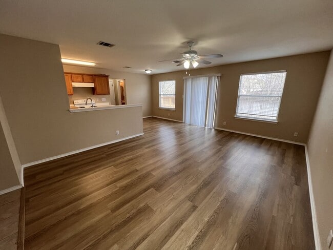 Building Photo - Generous Outdoor Space & Lawn Care Included!