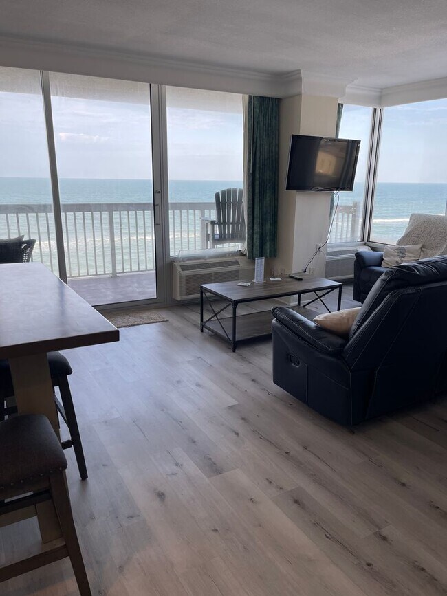 Building Photo - Oceanfront Corner View Condo - BEST VIEW & Wake up to the Oceanview from bed! DEPOSIT-FREE Rentin...