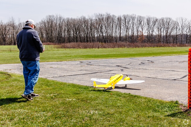 Chicagoland Radio Control Modelers Club members test out their planes at Busse Woods.