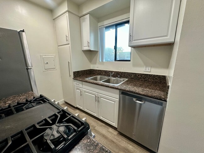 Building Photo - 12236 Pacific Ave