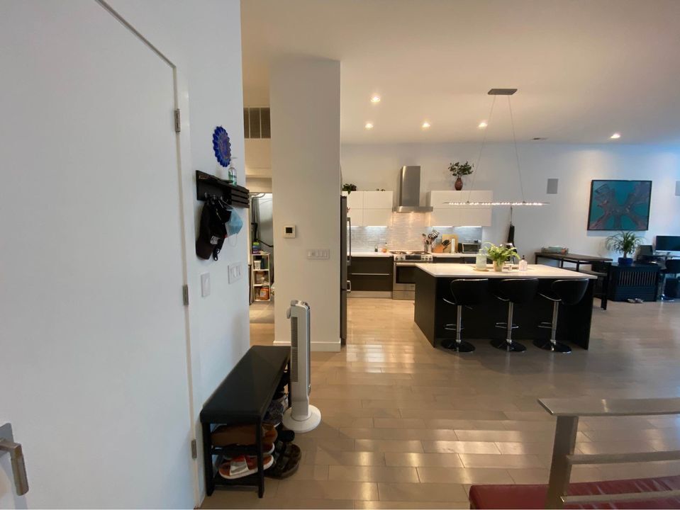 At the top of the stairs - looking into the kitchen - 1708 N Damen Ave