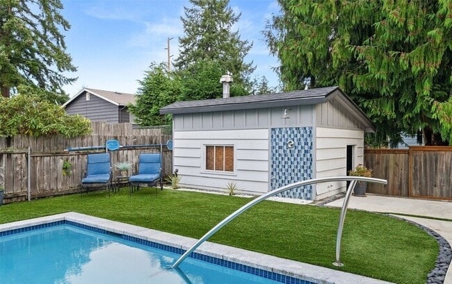 Building Photo - Updated Mid-Century 4BR Home with Pool, Deck & Designer Kitchen