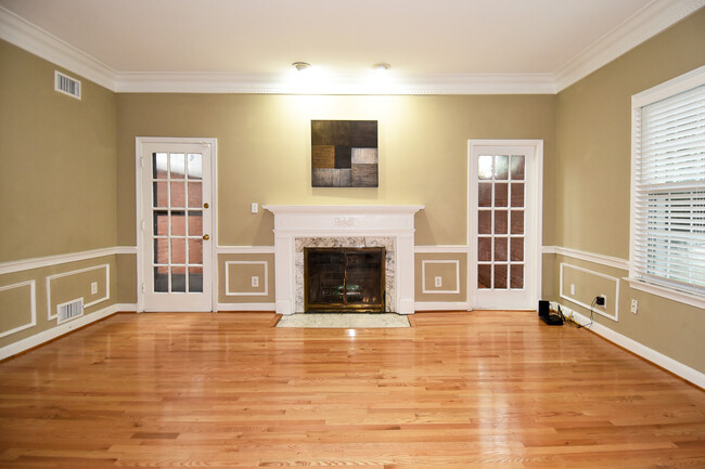 LIVING ROOM WITH FIREPLACE - 4200 River Rd NW