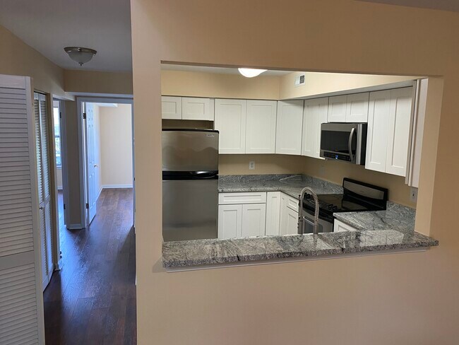 Hallway to 2 Bds & Kitchen - 13636 Orchard Dr