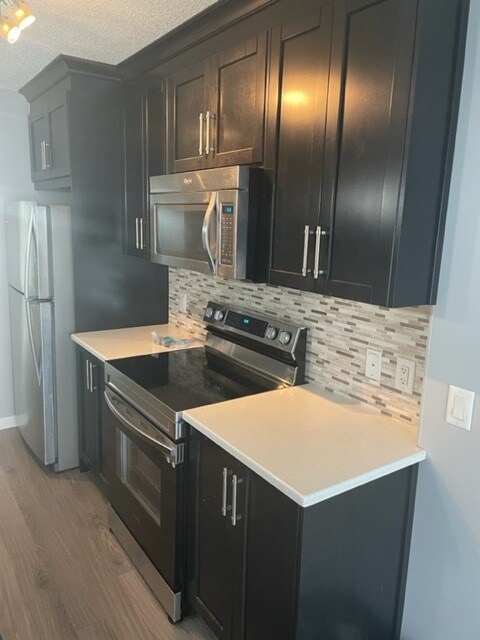 Photo du bâtiment - 274 100 Auburn Meadows Pl S E