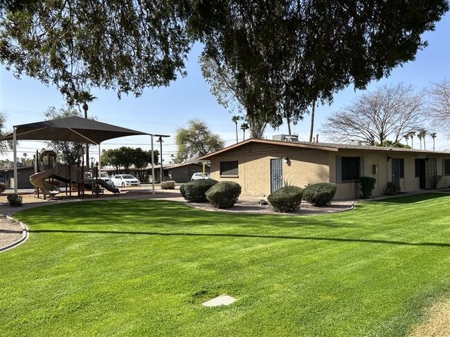 Building Photo - Paradise Village Apartments