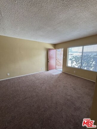 Building Photo - 6015 10th Ave