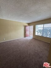 Building Photo - 6015 10th Ave
