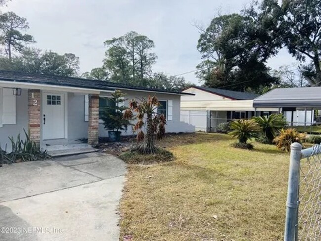 Building Photo - Charming & Modern 3-Bedroom Oasis in Duval...