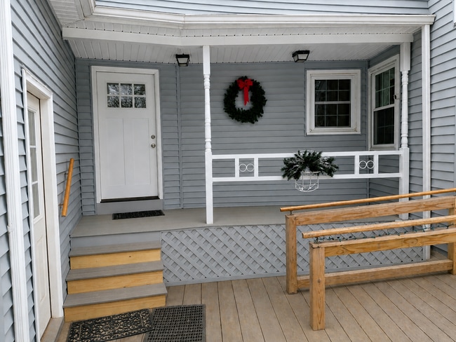 Entrance and porch for the studio apartment. (AI removed the snow) - 217 Bigelow Hill Rd