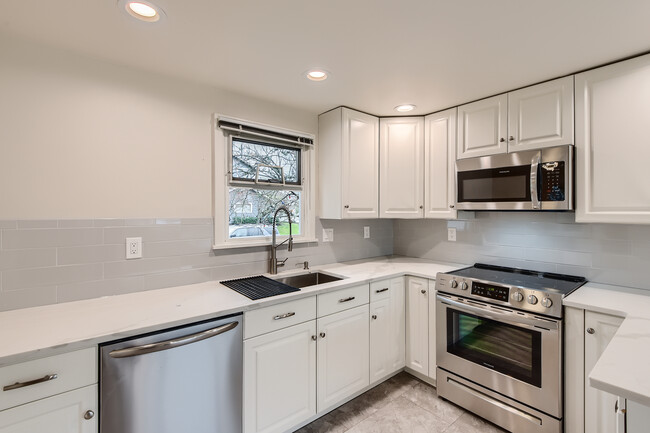 Kitchen with newer appliances - 5623 57th Ave NE