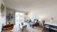 Located at 530 N Edison St in Kennewick, Washington, this one-bedroom, one-bathroom unit offers a well-organized single-floor layout designed for comfortable everyday living. The living room serves as the heart of the home, featuring plush carpet flooring, a textured ceiling, and a sliding glass door that invites natural light while providing direct access to the outdoors. The open arrangement accommodates both a seating and dining area, making the space feel versatile and functional. Adjacent to the living area, the kitchen and dining space transition smoothly with wood-style flooring that adds warmth and visual contrast. The bedroom is a quiet, carpeted retreat featuring a sliding closet with panel doors and a textured ceiling, offering a calm and private atmosphere. The bathroom is well-appointed with a granite-topped vanity featuring white cabinetry and brushed nickel hardware, a full tub-shower combination with a curved curtain rod, and wood-style flooring that ties the room together with a clean, modern aesthetic. Neutral wall tones throughout the unit create a cohesive and inviting ambiance, while the efficient layout makes the most of the available space. This unit is a practical and comfortable option in the Kennewick area.