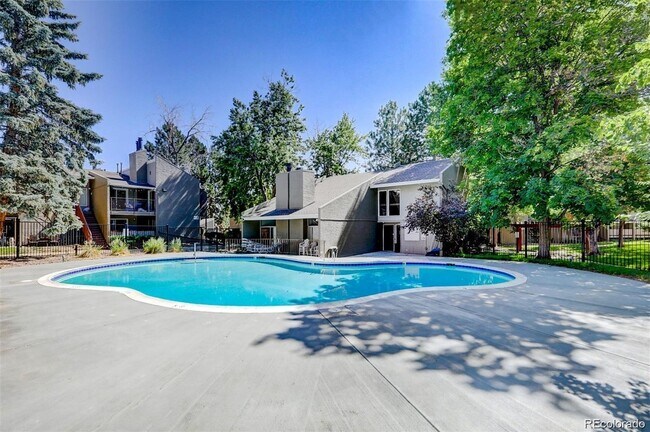 fitness center and pool in condo building - 5300 E Cherry Creek South Dr