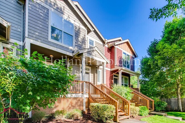 Building Photo - Fantastic Townhouse with 2-Car Garage in E...