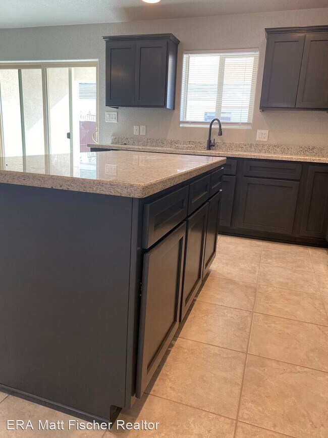 Foto del edificio - 4 br, 2 bath House - 11665 E 33rd Pl
