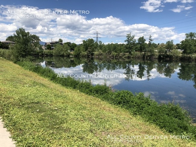 Building Photo - Beautiful Condo is Four Acre Lake in Arvada