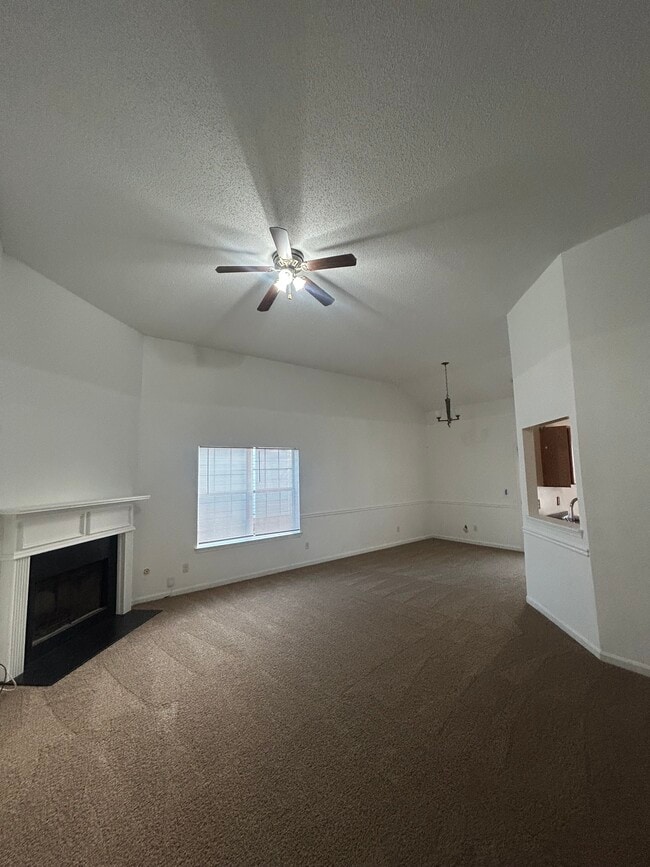 Family Room w/ Fireplace - 65 Waters Edge Way
