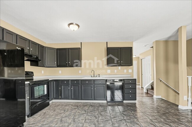 Foto del edificio - 6401 Sharps Ridge Ct